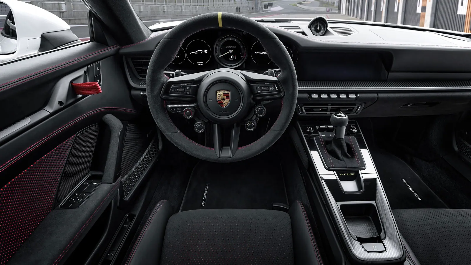 Kokpit GT3 RS z kierownicą z pokrętłami i fotelami kubełkowymi